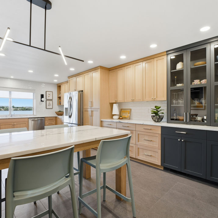large kitchen remodel with peninsula and china cabinet