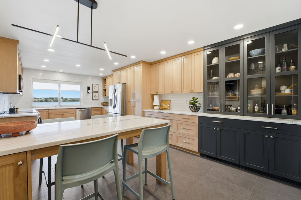 large kitchen remodel with peninsula and china cabinet