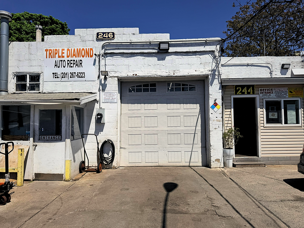 Exterior of Triple Diamond Auto Repair at 244-246
