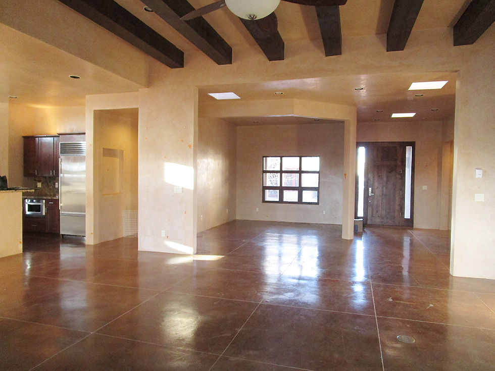 Removing a large wooden bookcase allowed for more light to enter open concept floor plan.
