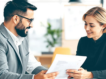 Two people going over business finances.jpg