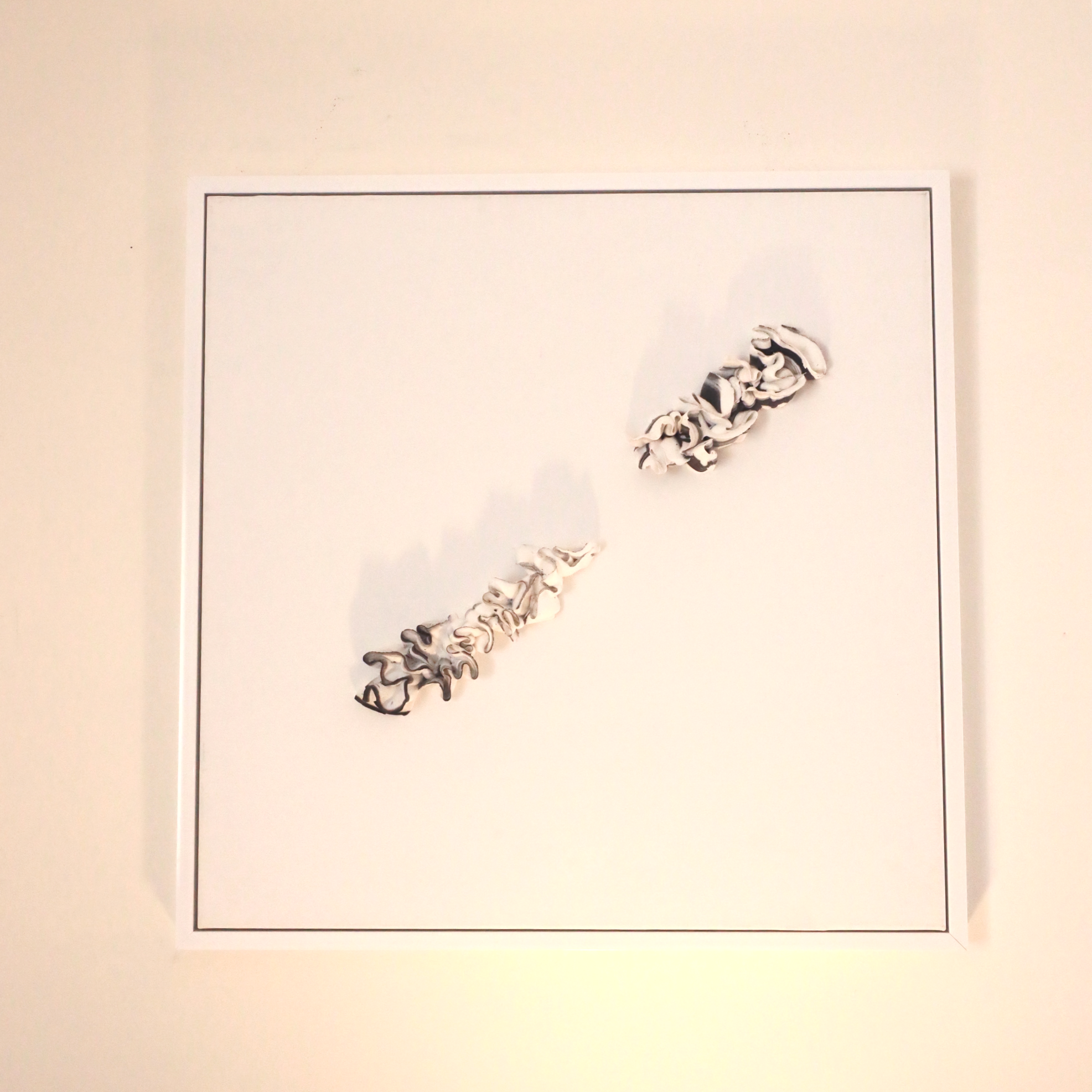 White art paste with black sprinkling edge on white cotton canvas