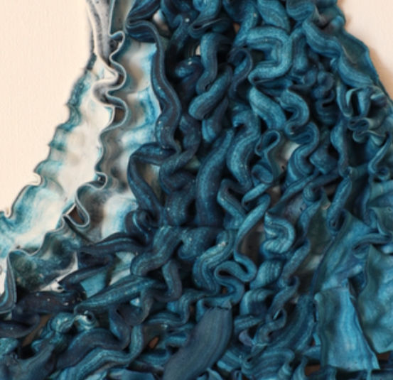 Close-up view of a nature-inspired 3D wall sculpture resembling tree bark texture