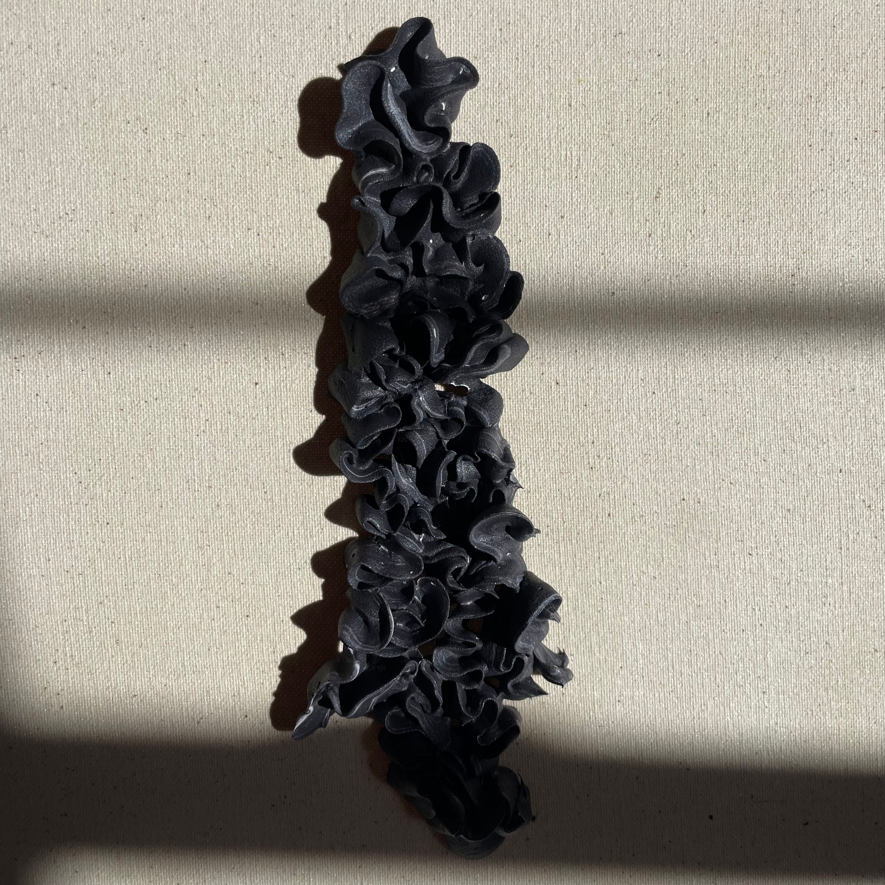 purple sprinkling  on a raw cotton canvas