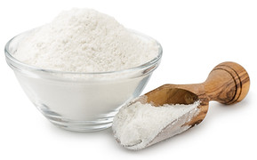 Wheat flour in bowl and scoop isolated o