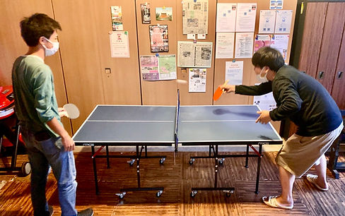 Ping pong table guests playing first shot 2020.jpg