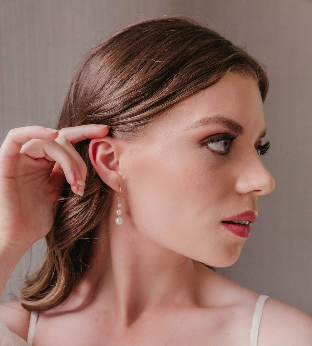 Bridal earrings with shimmering Preciosa pearls, perfect for understated elegance on your special day.