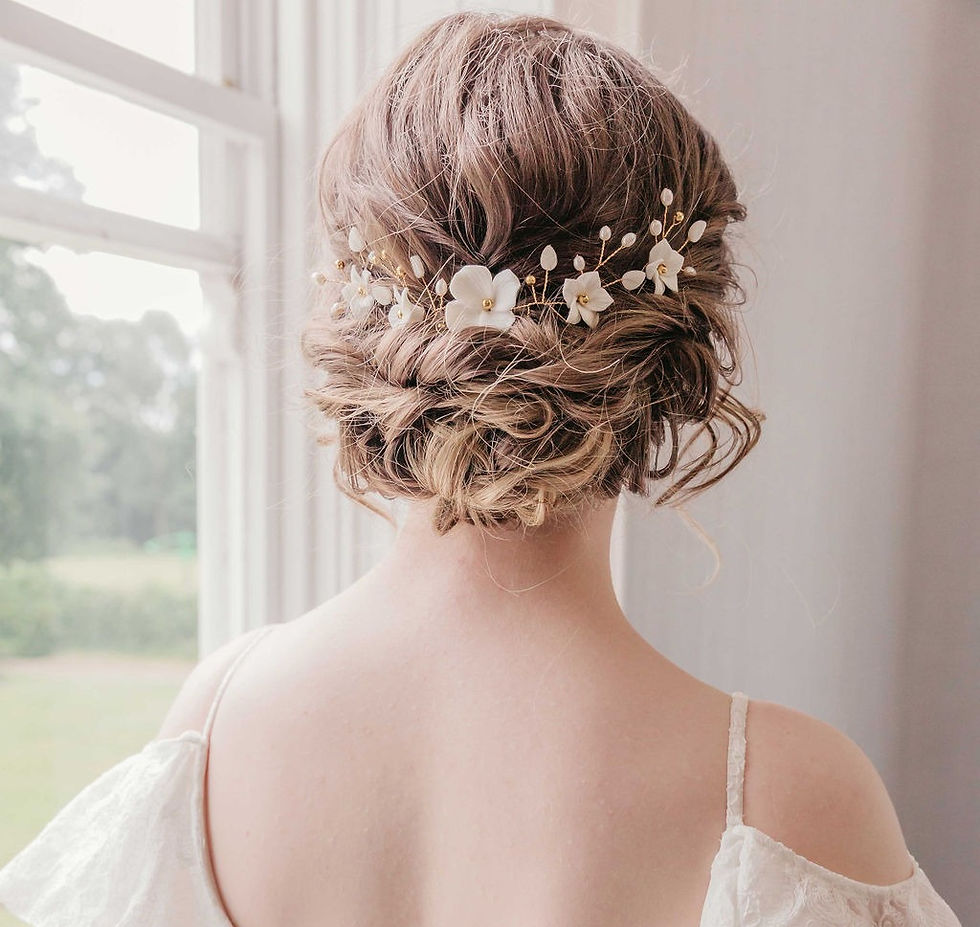 Thumbnail: Dreamy floral bridal hair accessories perfect for a boho, rustic, or outdoor wedding.