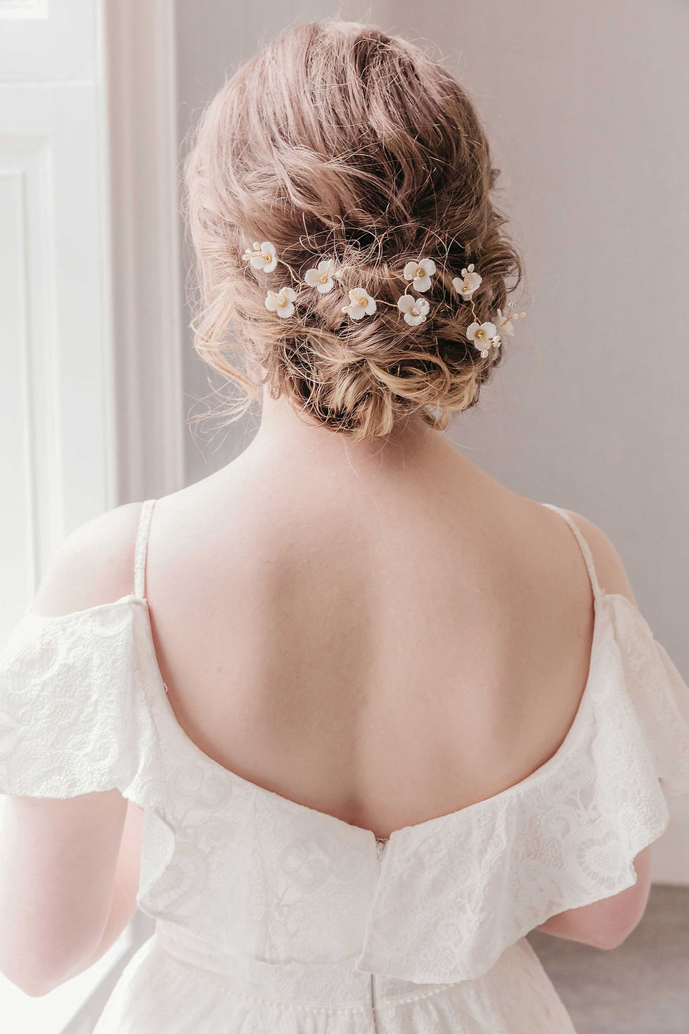 Thumbnail: Whimsical floral bridal hair accessories with pearls perfect for Glastonbury brides and autumn festivals