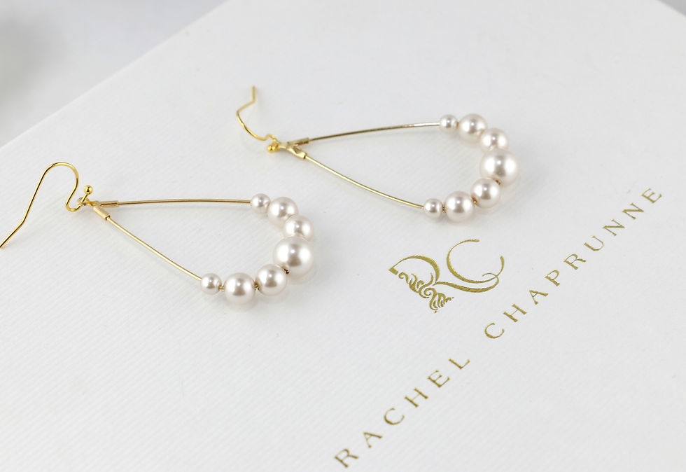 Handmade teardrop earrings with multi-sized pearls, ideal for bridal showers, engagement parties, or vow renewals.