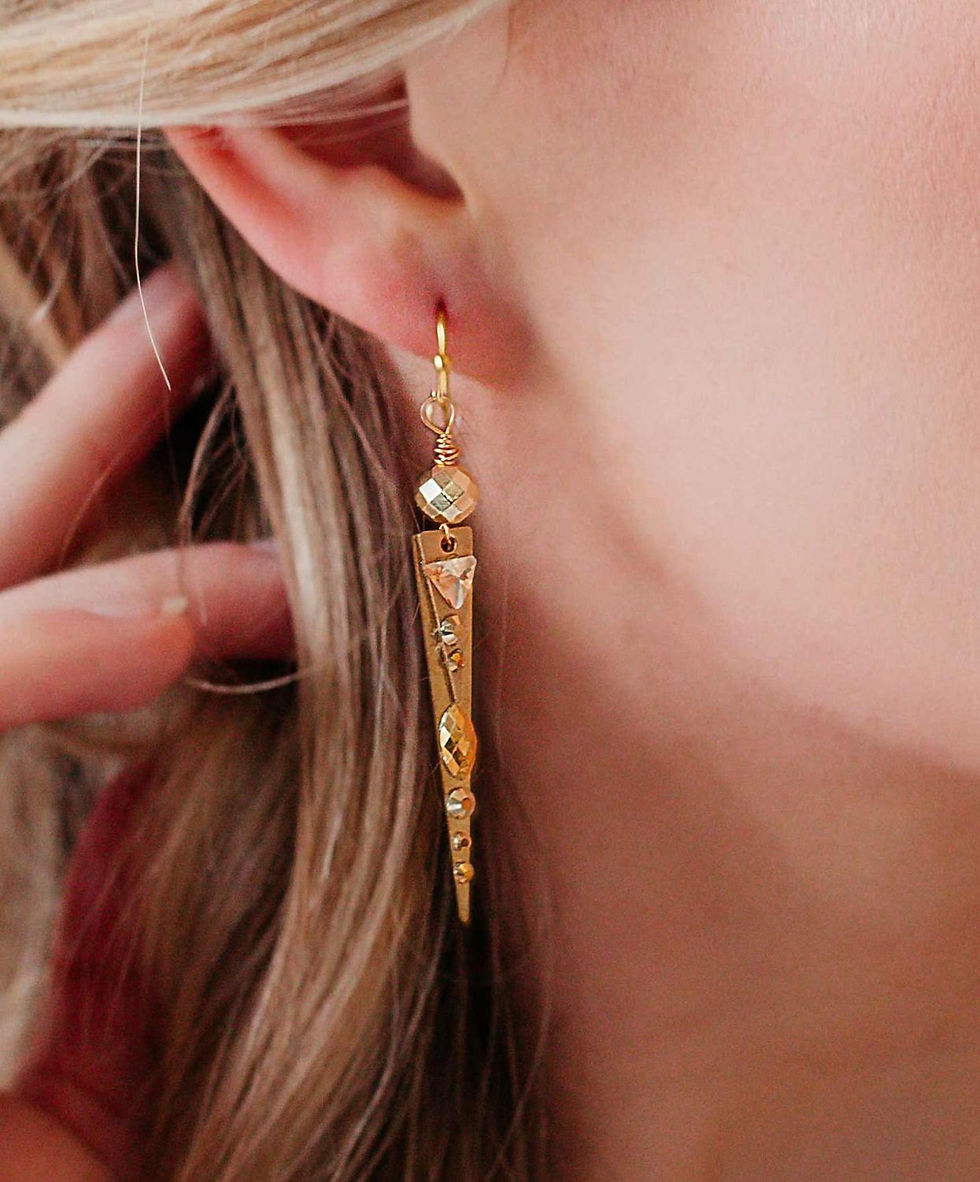 Thumbnail: Unique earrings with faceted gold crystals, perfect for a Halloween costume, music festival, or as a bold anniversary gift.
