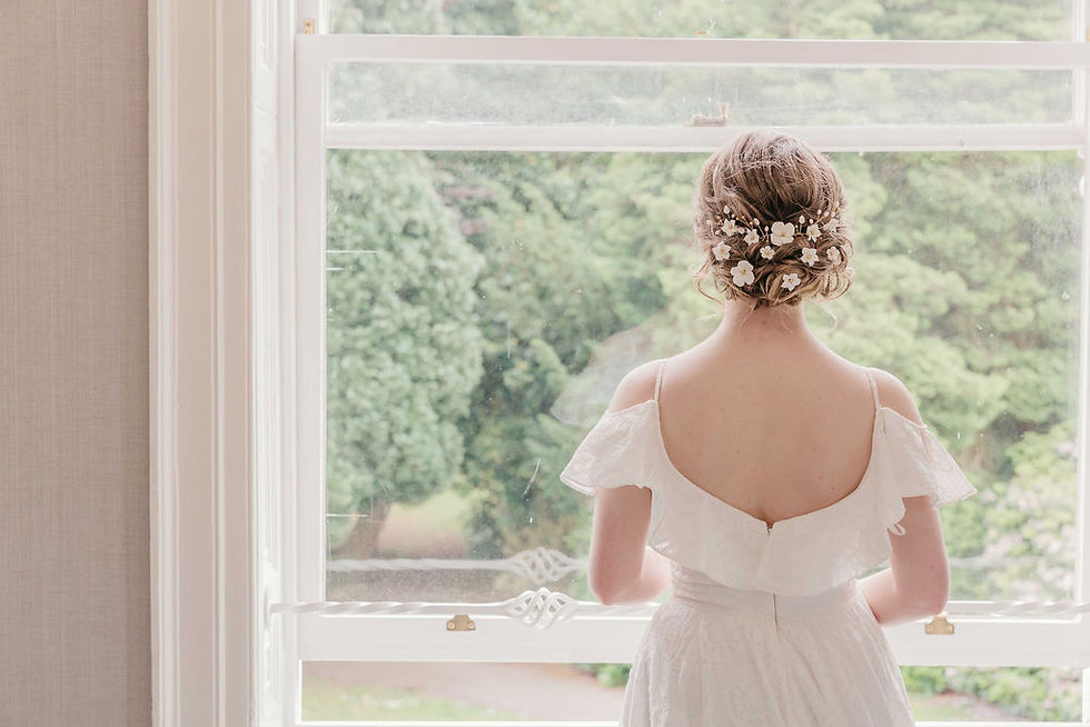 Thumbnail: Handmade boho wedding hair accessories with pearl stems and floral detailing.