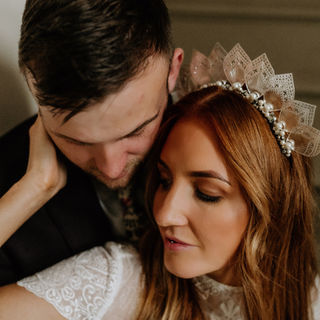 Real bride Leah and groom at their rustic boho barn wedding