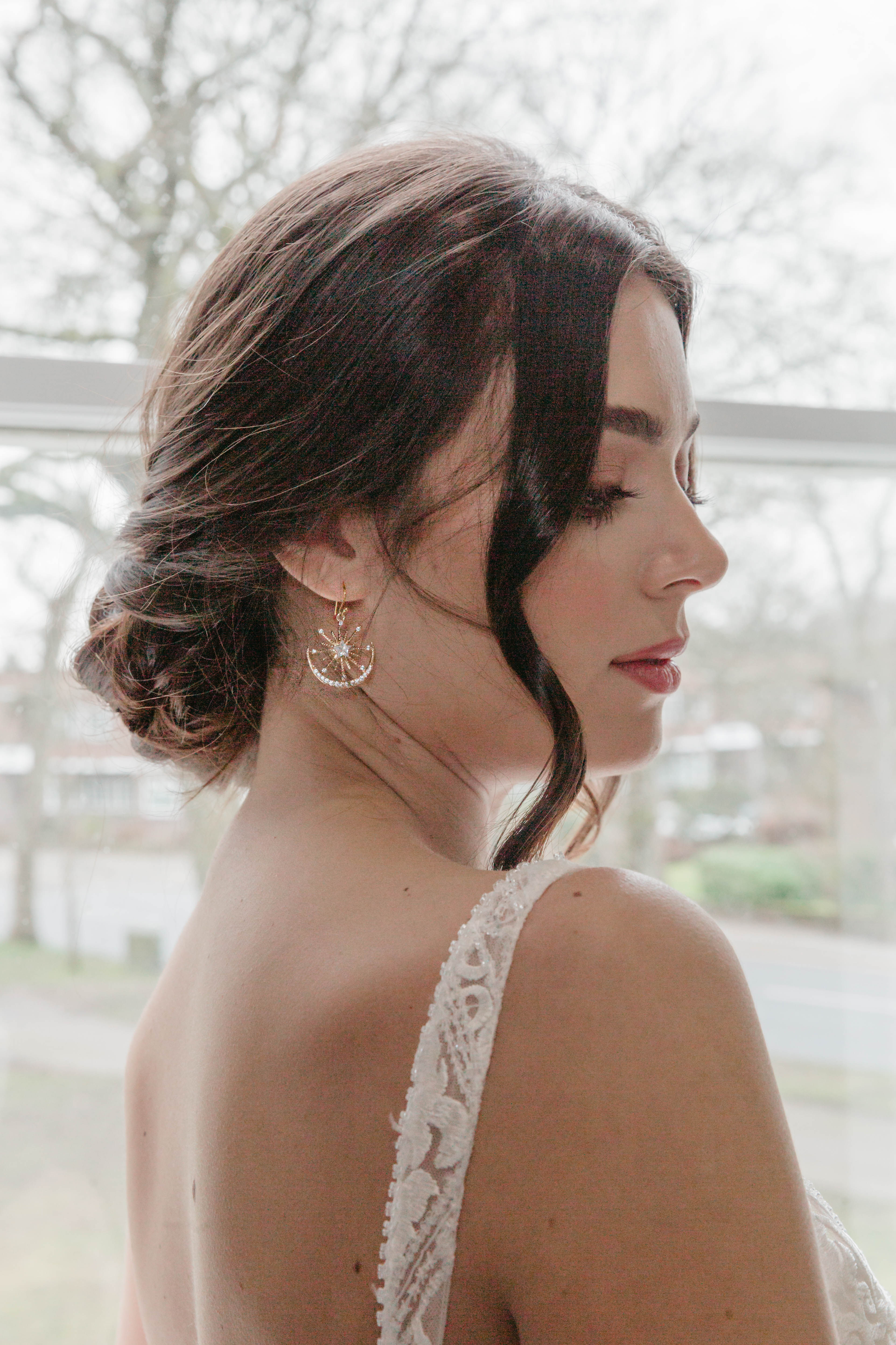 Bridal earrings with gold-plated crescent moons and sparkling stars, perfect for celestial weddings or boho brides with a cos