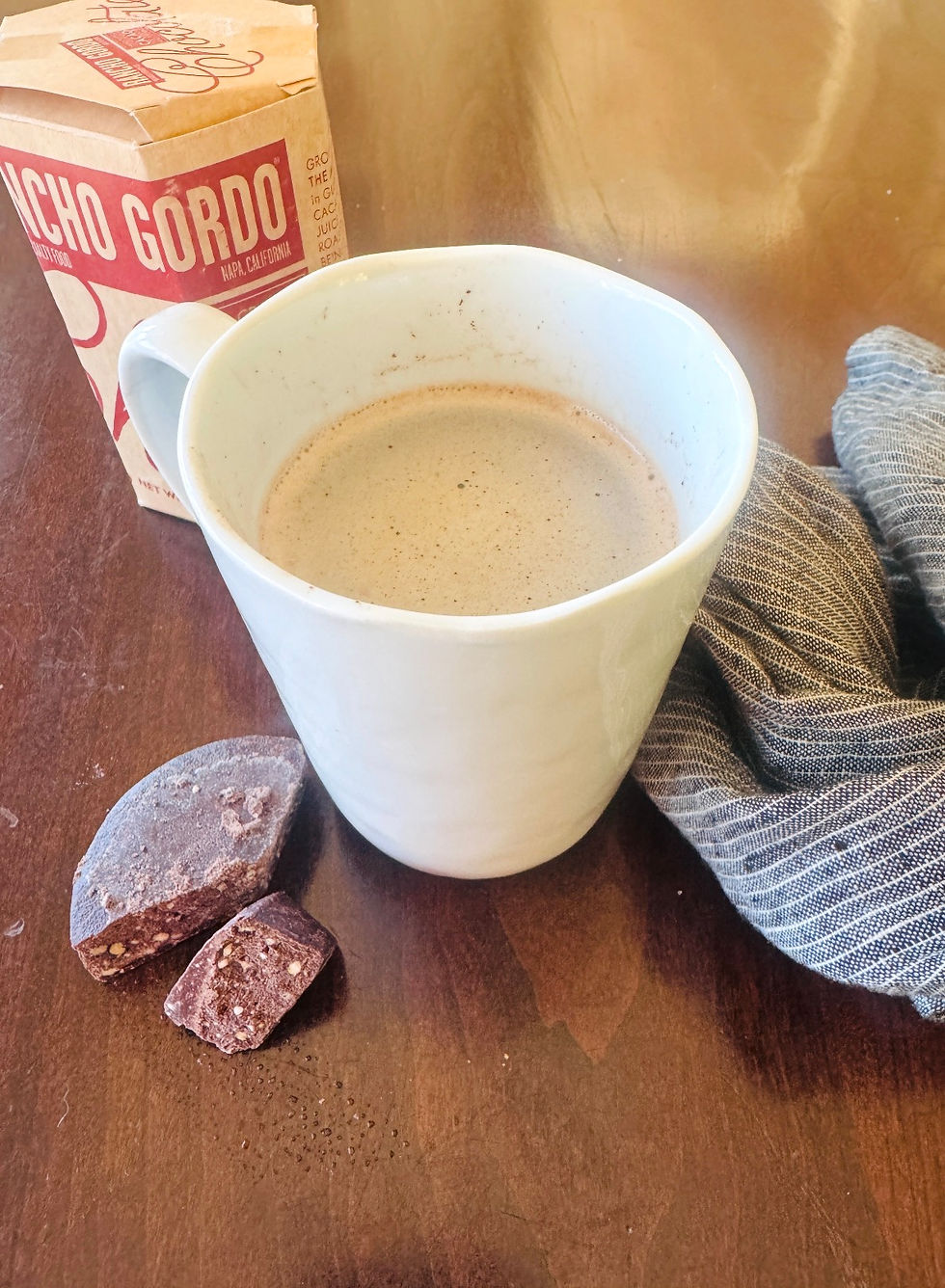 I cut Mexican Hot chocolate into 6ths and then I added warm milk and crushed the chocolate up with a whisk.