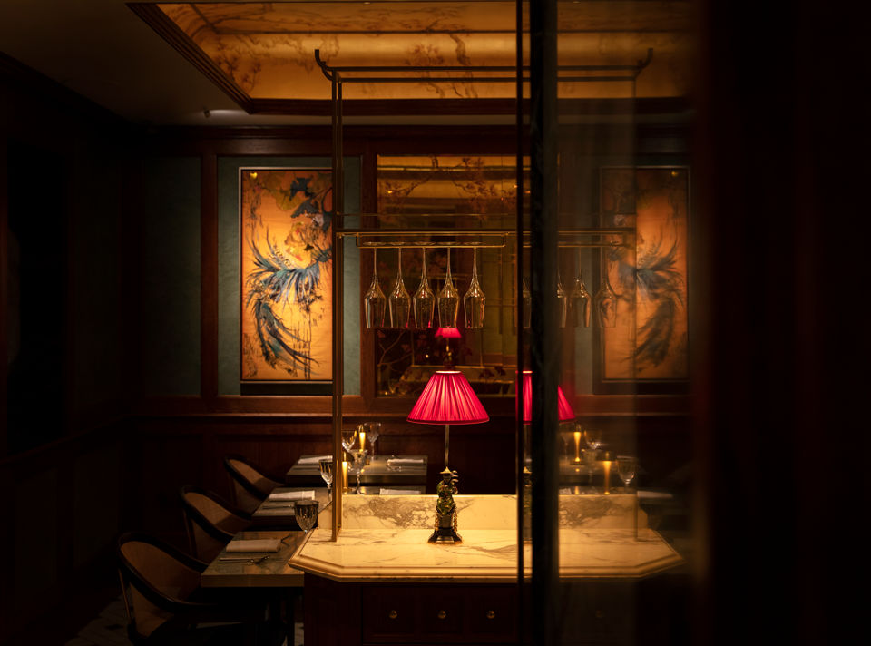 The story of Ming nobility who travelled the globe to bring the culture and cuisine of their dynasty to the known world.

Apart from the cuisine, the Ming nobility brought botanicals, such as Ginkgo leaves, a sacred concept of yin and yang symbolising longevity and vitality.

The trade route expansion was a large part of the era when the Ming dynasty was in power.

The interior of House of Ming was conceived by award-winning designers Atelier Wren, the design incorporates subtle elements of Chinese aesthetics.

The restaurant has a stunning blend of green hues and lush red Lacquer, which are complemented by antique brass finishings and bespoke furniture with custom Celadon Ceramics and handmade artworks by Jacky Puzey.

Come, be part of the story at House of Ming.