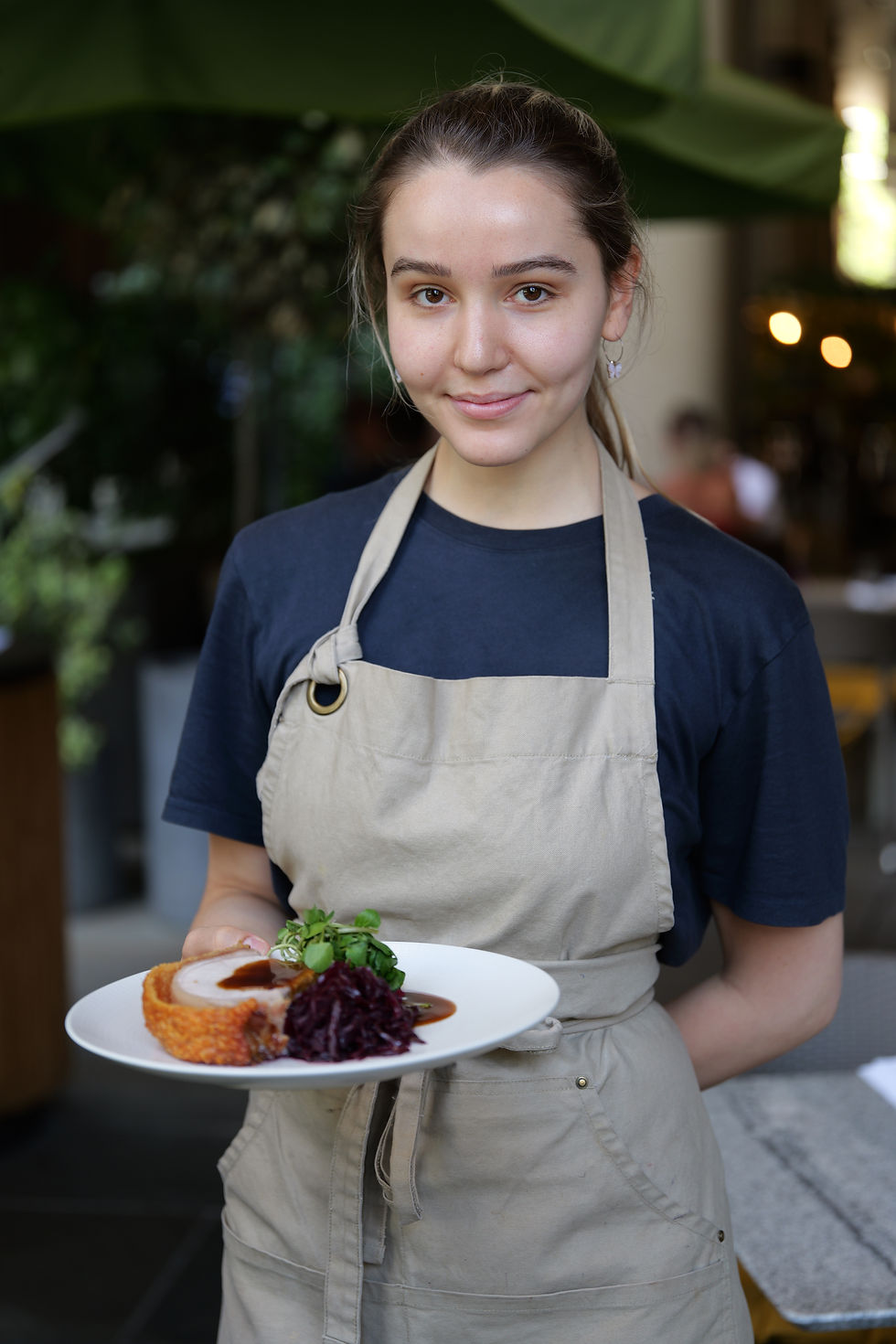 a waitress at Etke-A restaurant in a bank