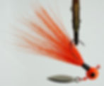 Side view of Orange Muffin - Ball Head Underspin Bucktail Jig