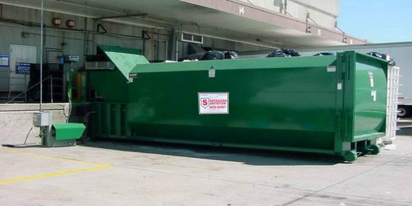 Commercial compactor unit by James R Santaguida Sanitation, designed for efficient waste management in large-scale operations.