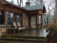 Stained outdoor new construction home and cabin.