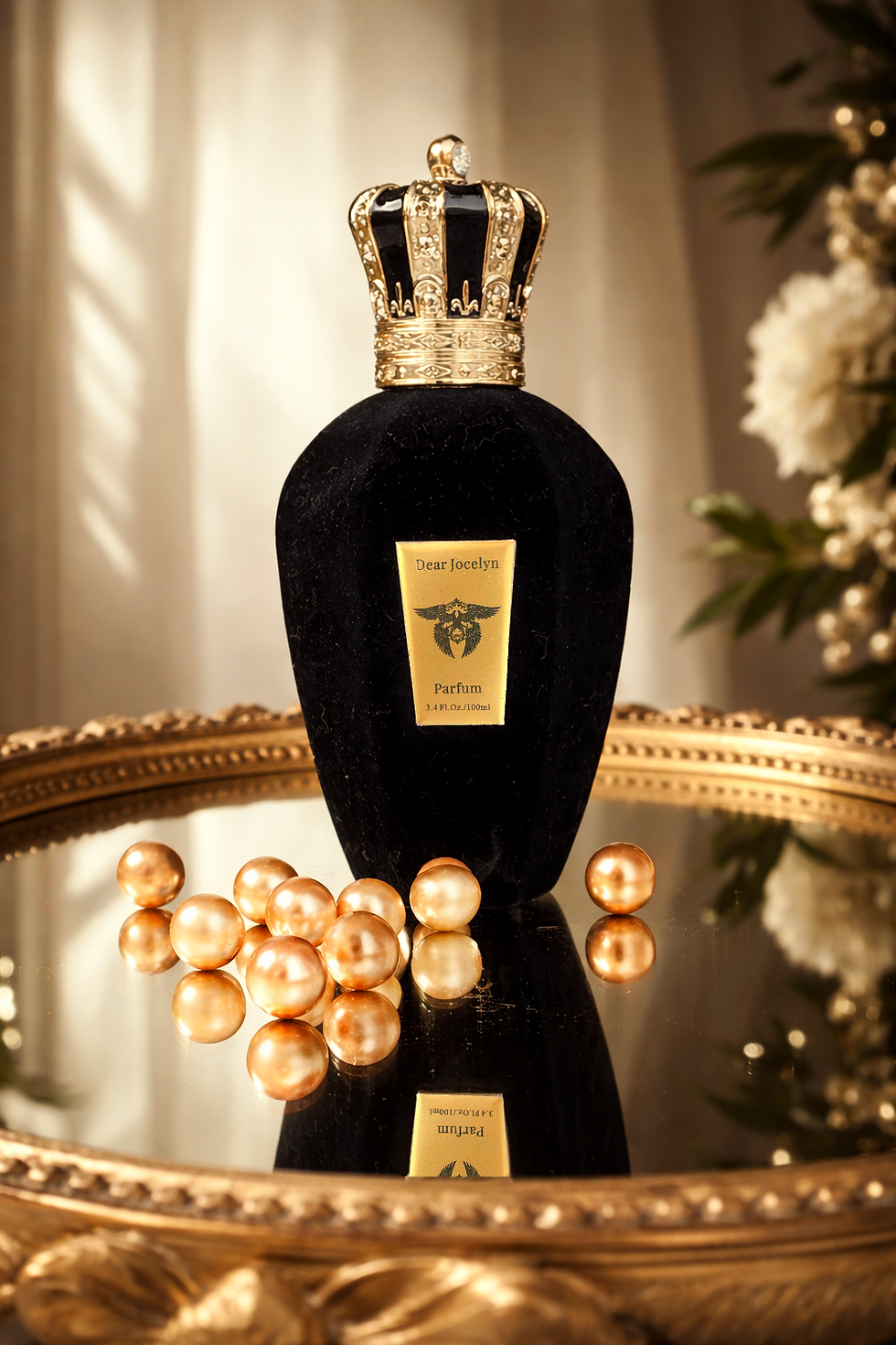 Elegant perfume bottle with crown(1).png