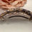 Thumbnail: Striking Curved Filigree hair barrette in our premium Acetate
