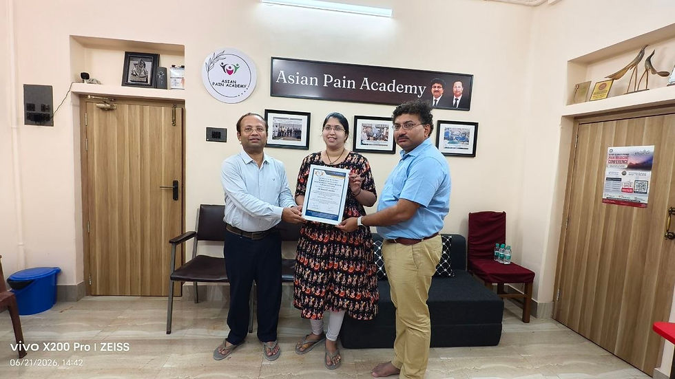 Dr. Madapati Anusha Receiving Asian Pain Academy Pain Management Workshop Completion Certificate From Dr Debjyoti Dutta and Dr Chinmoy Roy