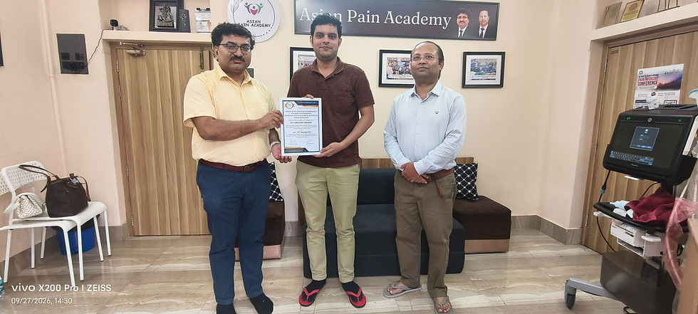 Dr. Abhishek Nanda receiving Asian Pain Academy 4-days Ultrasound-Guided Procedures in Pain Medicine workshop certificate from Dr.Debjyoti Dutta and Dr.Chinmoy Roy.