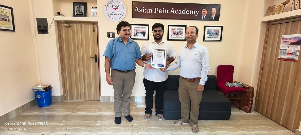 Dr. Mohammed Arif from Haryana receiving the Asian Pain Academy 4-day Pain Management workshop certificate from Dr Debjyoti Dutta and Dr Chinmoy Roy,