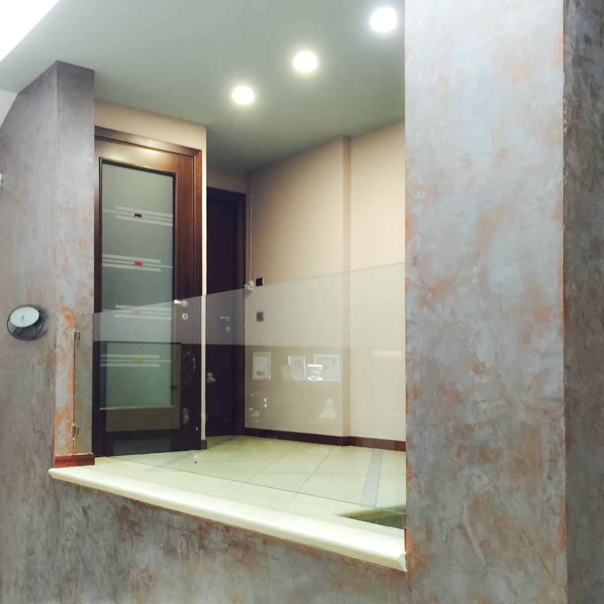 Parapetto e porta in vetro