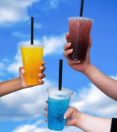 2 arms reaching in frame holding colorful energizing teas, purple drink on top of blue drink, 1 arm reaching from the left size holding an orange drink. all in plastic cups.
