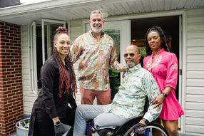 Group of friends posing outside home