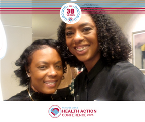 Two women smiling at Health Action Conference 30