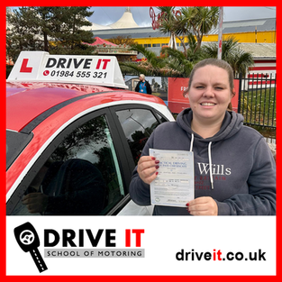 Shayne passes her driving test with zero faults