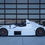 Thumbnail: White 2023 Radical SR3 XX with black wheels. side profile.