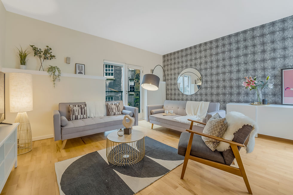 Bright, Stylish Living Room with Comfortable Sofa and Flat-screen TV