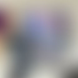 A hybrid learning system featuring three monitors in the foreground with an LCD screen and PTZ camera mounted to the wall in the background.