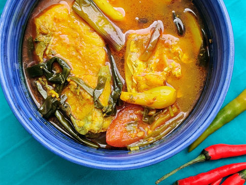 Bhetki - Pyajkoli'r jhol or Light Fish curry with Barramundi & Spring onion