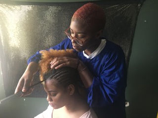 Yes, you can get arrested for braiding hair in N.J. but that may change