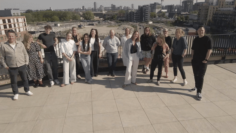 Drone zooming out from a rooftop of the turnerbates team