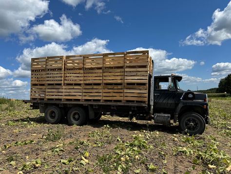 truck carrying wooden custom crates