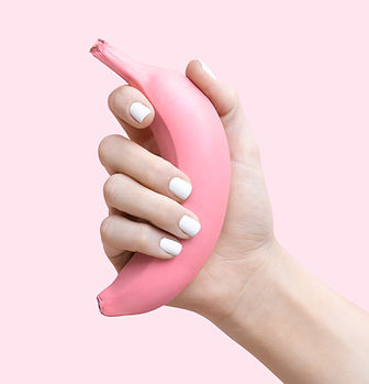 Han holding pink banana banane rose