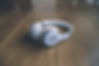 White-Headphones-on-table.jpg