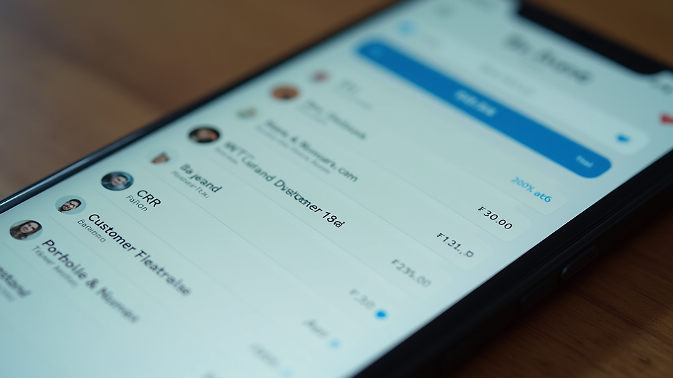Close-up view of a smartphone displaying CRM app with customer data