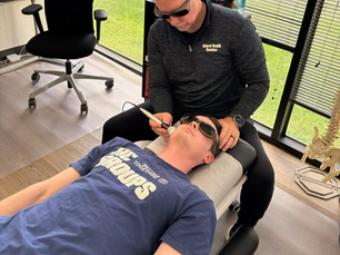 Doctor discussing health and overall wellness with a patient during a consultation.