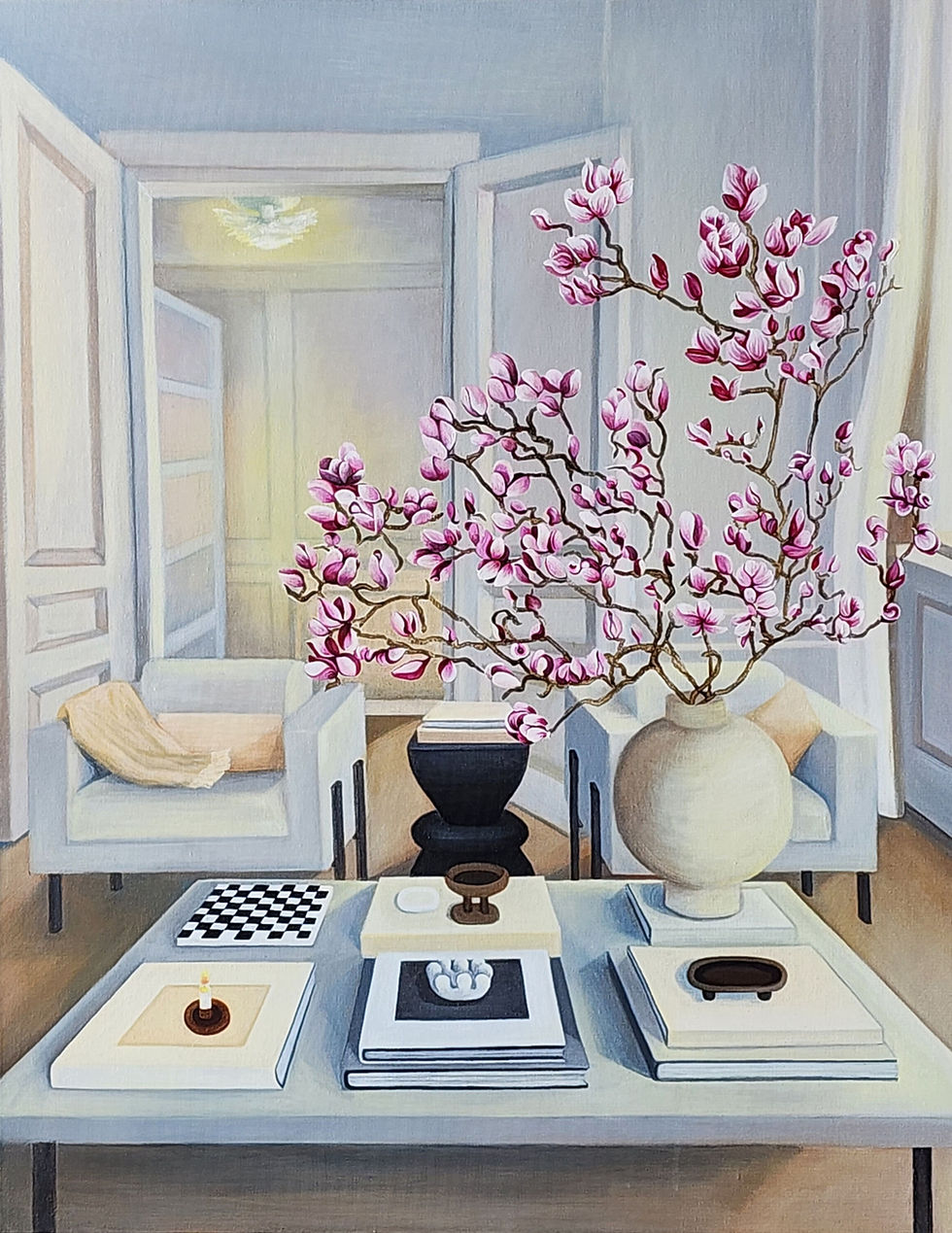 An oil painting by Karlalise Horstmans featuring an stylish interior scene with an oversized magnolia branch in a large vase on a coffee table with armchairs in the background and a double door leading to a bedroom with a beautiful lampshade casting ligtht on the floor in the background