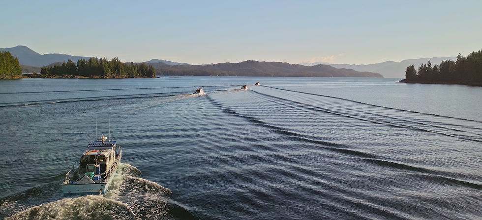 an image of the boats headed out to go fishing in the morning at Sportsman's Cove Lodge in Alaska