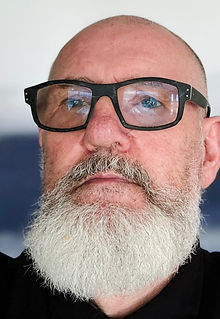 Image of Frank Liddy, white man with black rectangle glasses and  white beard, he is looking directly at the camera