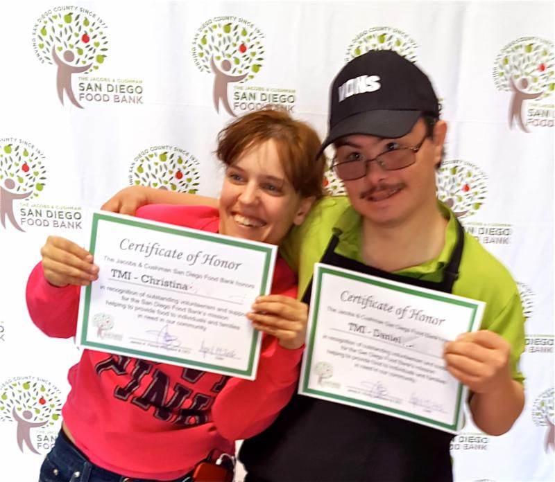 Christina and Daniel receiving their awards