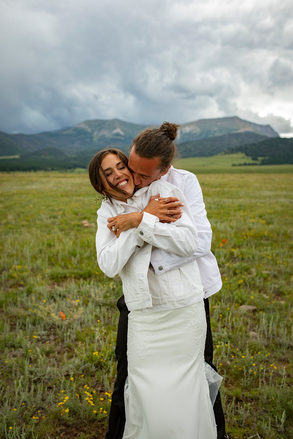 Colorado mountain wedding ceremony with alpine wildflowers